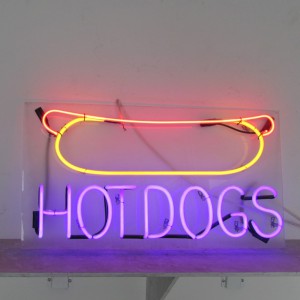 Hot Dog in Red/Yellow above "HOT DOGS" in purple